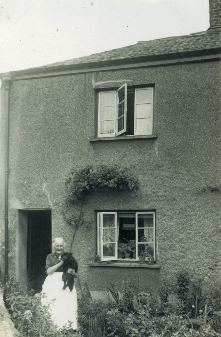 Jane Bartlett outside No 8 Pilton Quay with 'Darkie' the Pomeranian